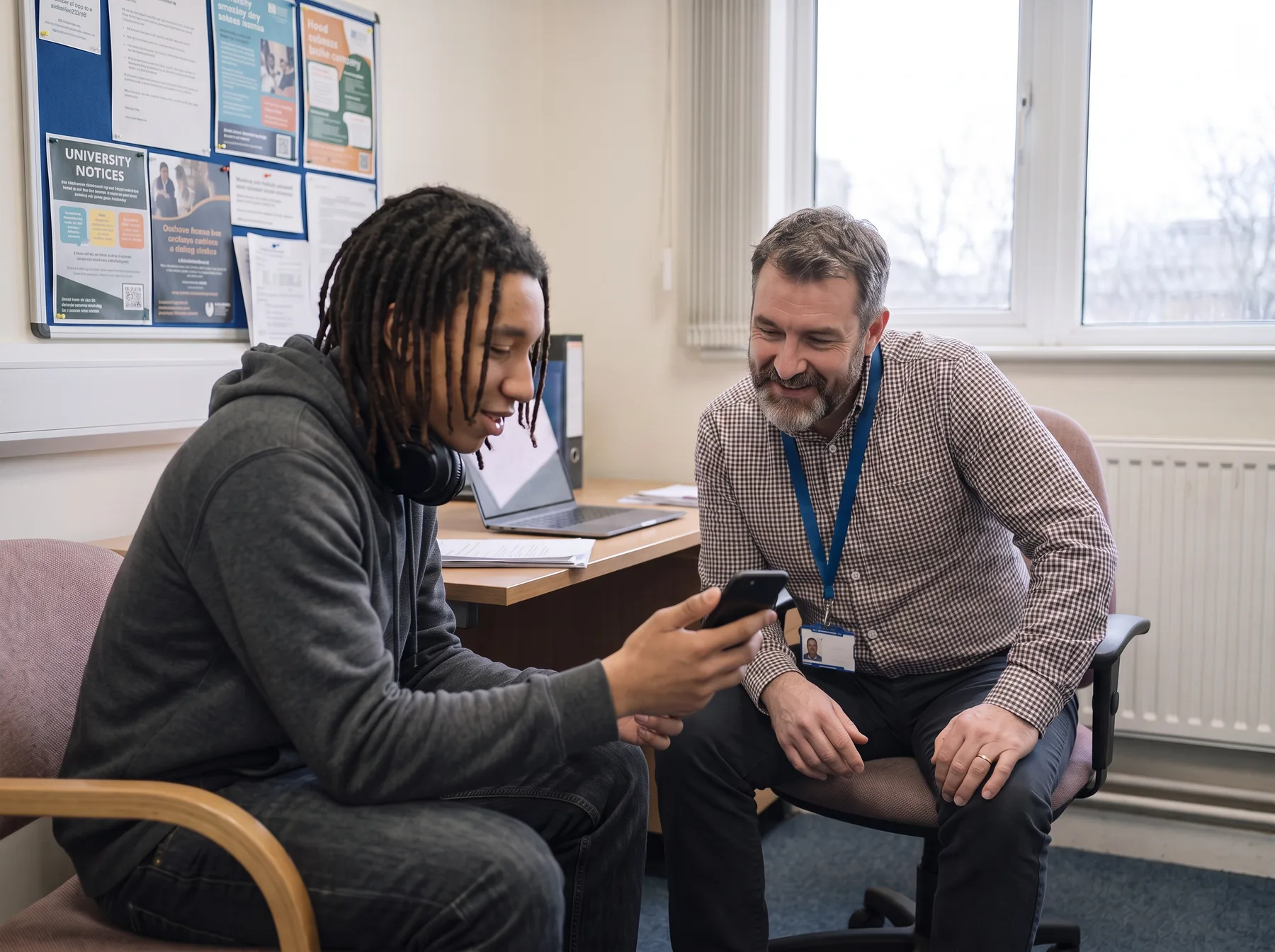 Back in the room, showing your counsellor the video that helped